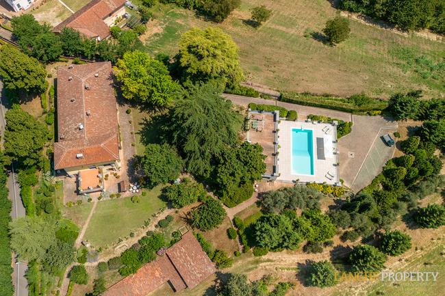 Located on it's own hill with views of vineyards, Alps and the Langhe hills