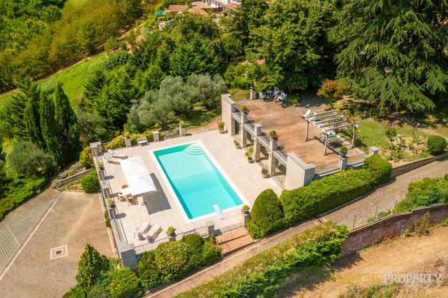 Located on it's own hill with views of vineyards, Alps and the Langhe hills